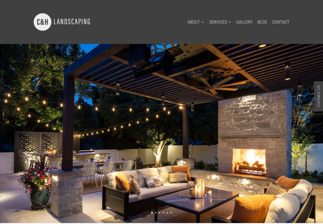 C&H Landscaping homepage with a full-width photograph of a pergola, fireplace and string lights, and no headline in the first screen